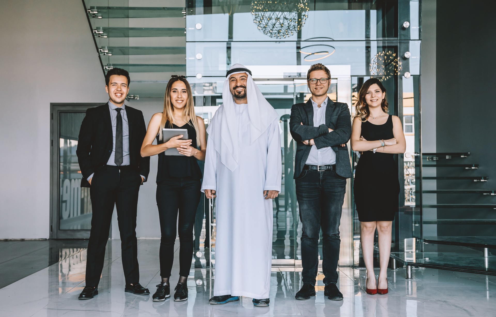 Portrait of business team with an Arab Businessman