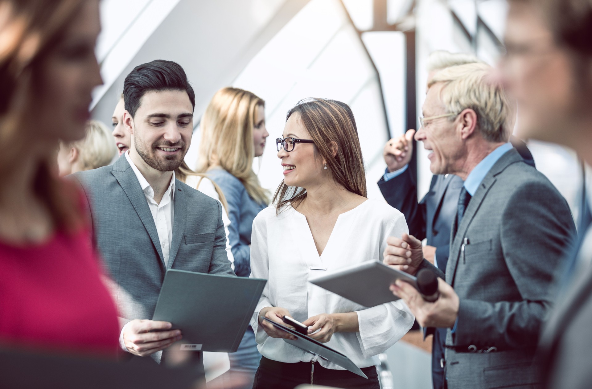 Business People on a Conference Event Discussing